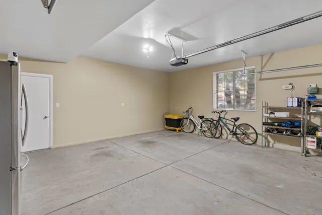 a front view of a house with sitting area