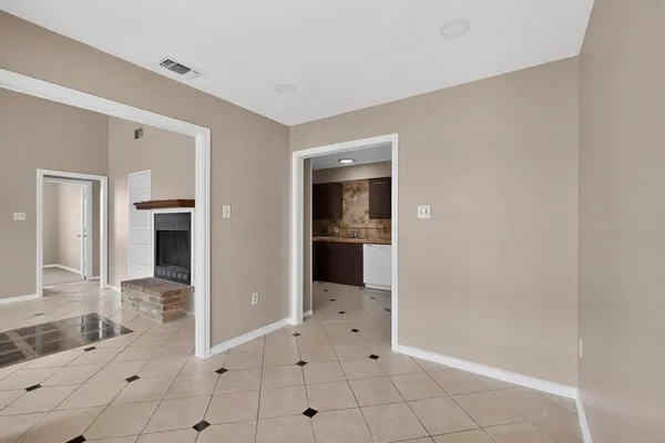 a view of a bathroom with mirror