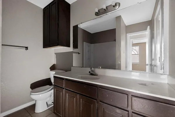 a bathroom with a sink and a toilet