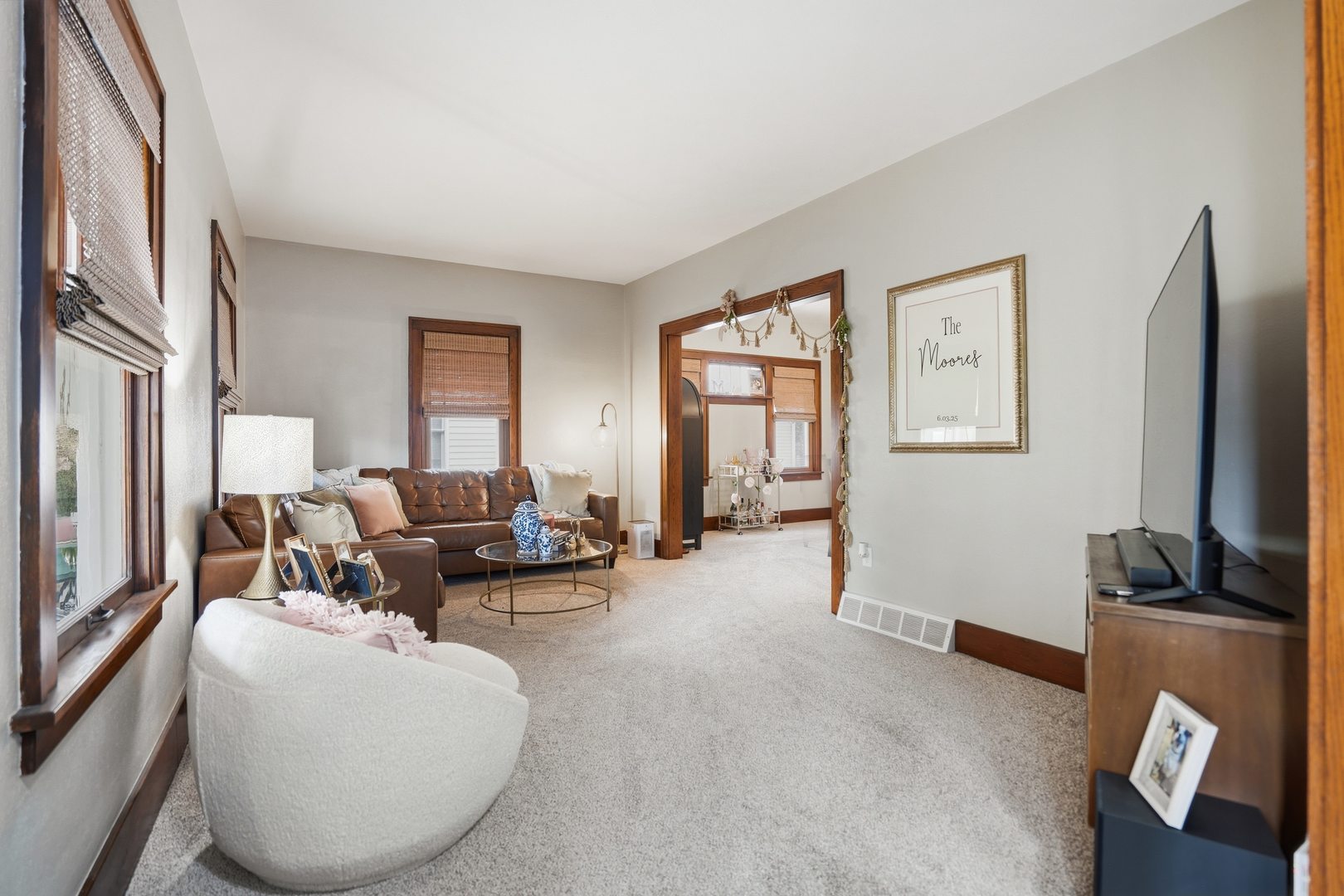 2431 14th Avenue Moline, IL 61265 - Photo 6 of 37 a living room with furniture window and a flat screen tv
