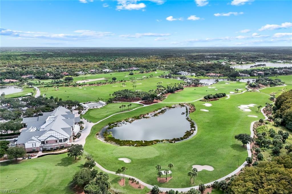 12832 Kinross Lane Naples, FL 34120 - Photo 29 of 44 an aerial view of a residential houses with outdoor space and street view