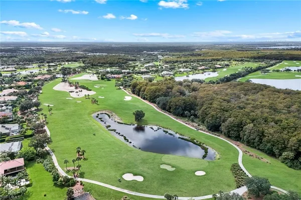 an aerial view of a golf course with an outdoor space