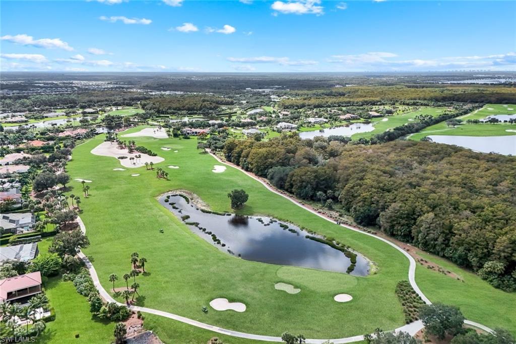12832 Kinross Lane Naples, FL 34120 - Photo 31 of 44 an aerial view of a golf course with an outdoor space