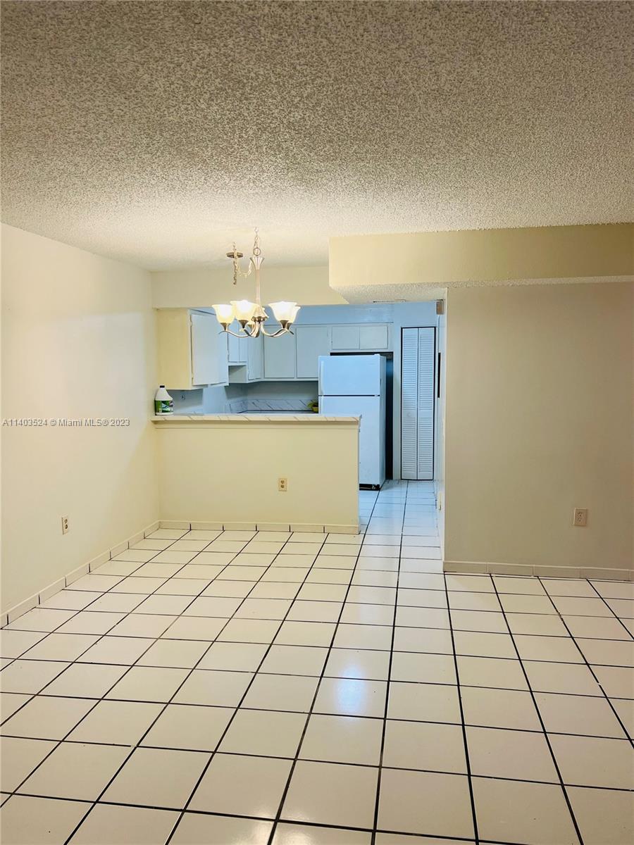 8400 Southwest 154th Cir Court, Unit 716 Miami, FL 33193 - Photo 5 of 6 a view of a kitchen