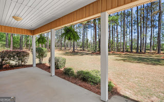 321 Anderson Road Statesboro, GA 30458 - Photo 33 of 45 a porch with a table in balcony