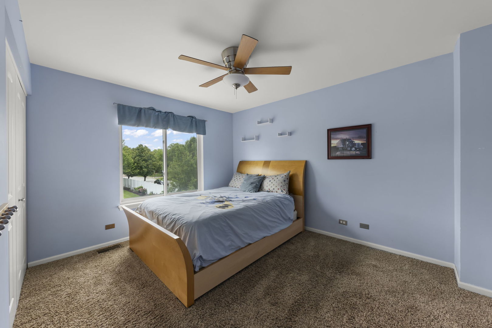 1462 Haversham Drive Aurora, IL 60502 - Photo 20 of 44 a bedroom with a bed and window