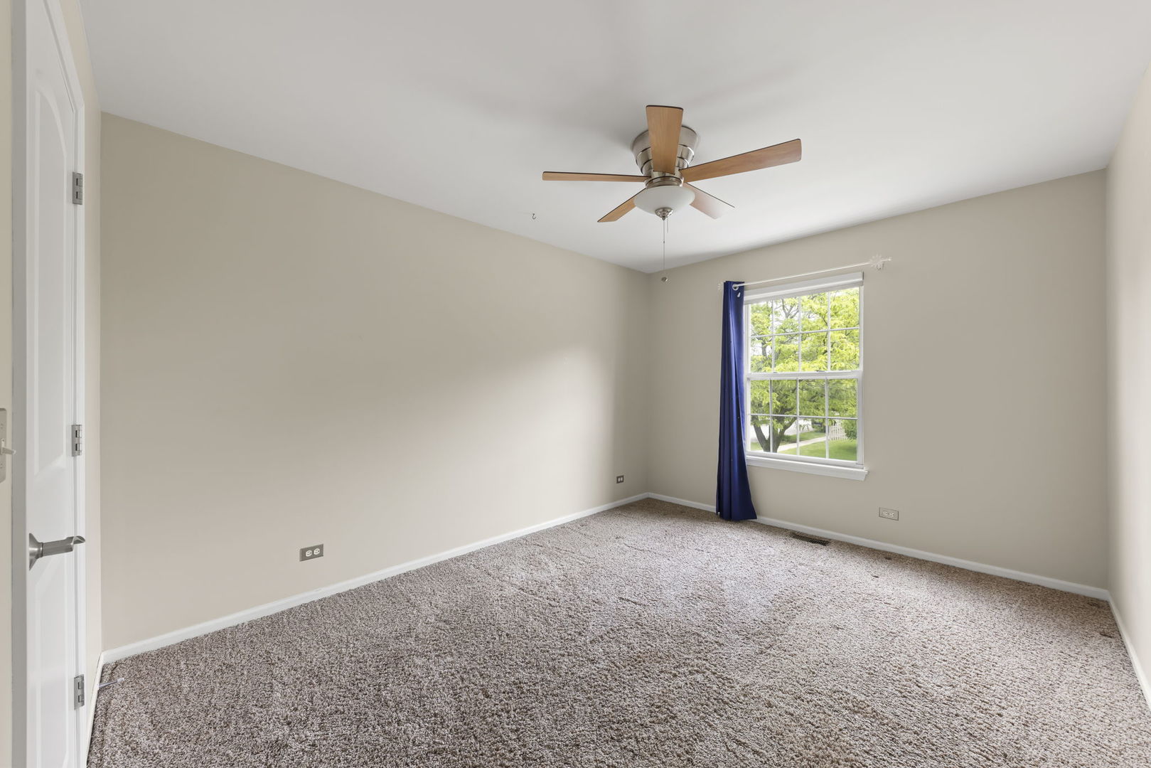 1462 Haversham Drive Aurora, IL 60502 - Photo 22 of 44 a view of room with a ceiling fan and window