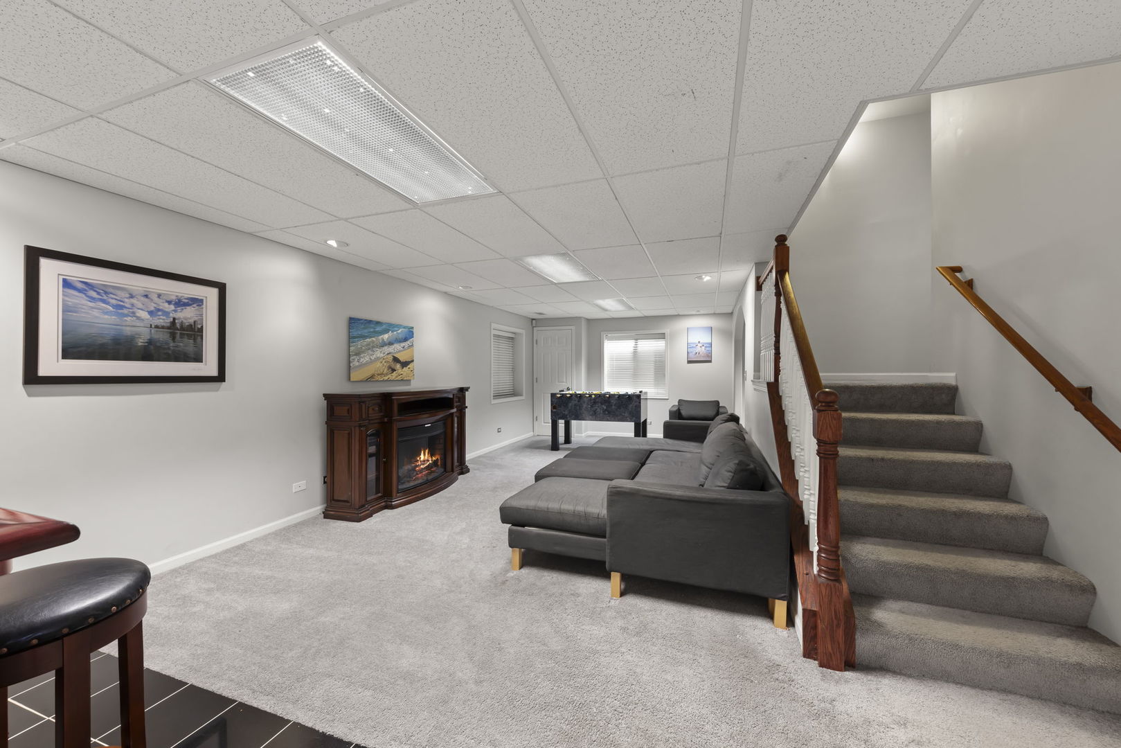 1462 Haversham Drive Aurora, IL 60502 - Photo 24 of 44 a living room with furniture and a fireplace