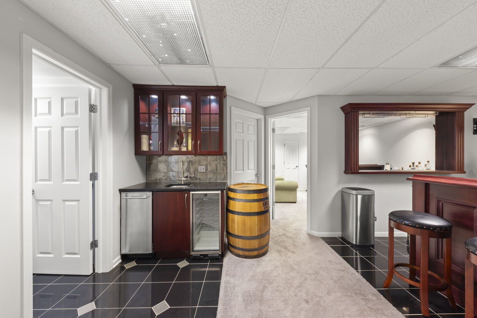 1462 Haversham Drive Aurora, IL 60502 - Photo 27 of 44 a living room with furniture a flat screen tv and kitchen view