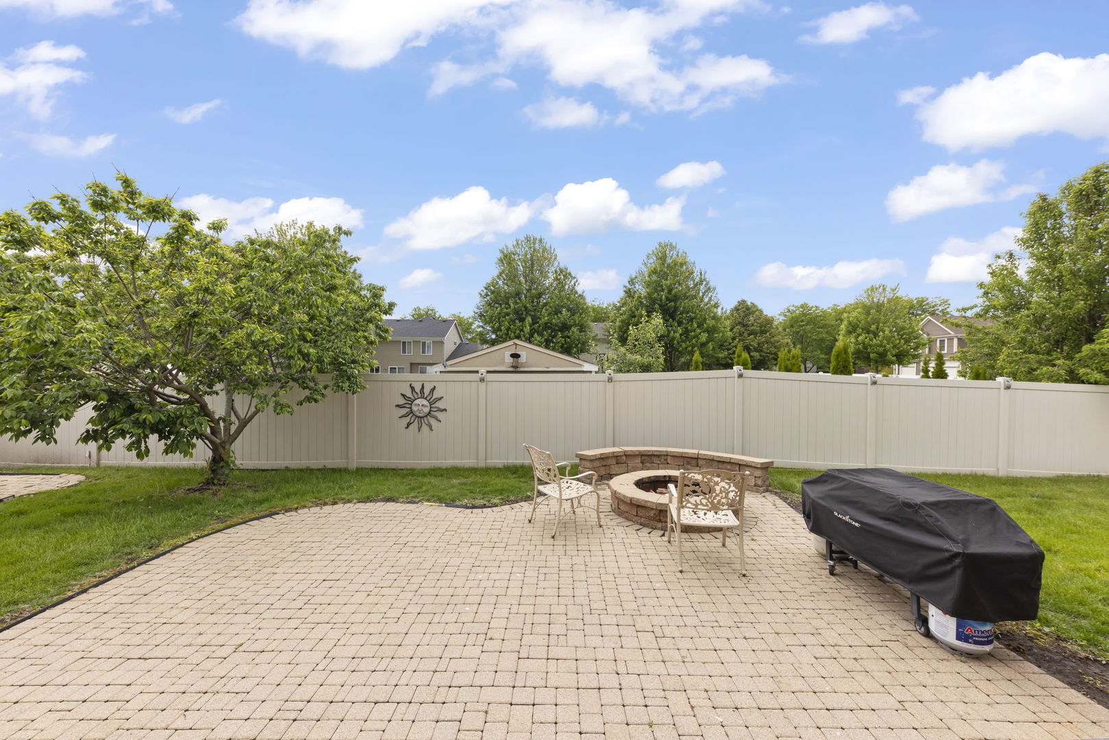 1462 Haversham Drive Aurora, IL 60502 - Photo 30 of 44 a view of a backyard with sitting area
