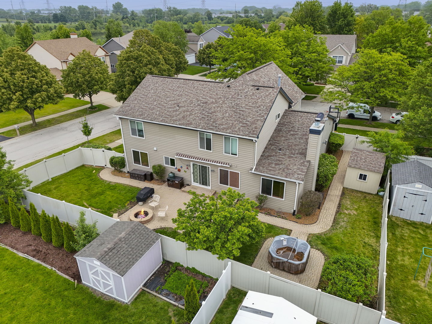 1462 Haversham Drive Aurora, IL 60502 - Photo 34 of 44 an aerial view of a house with garden space and street view