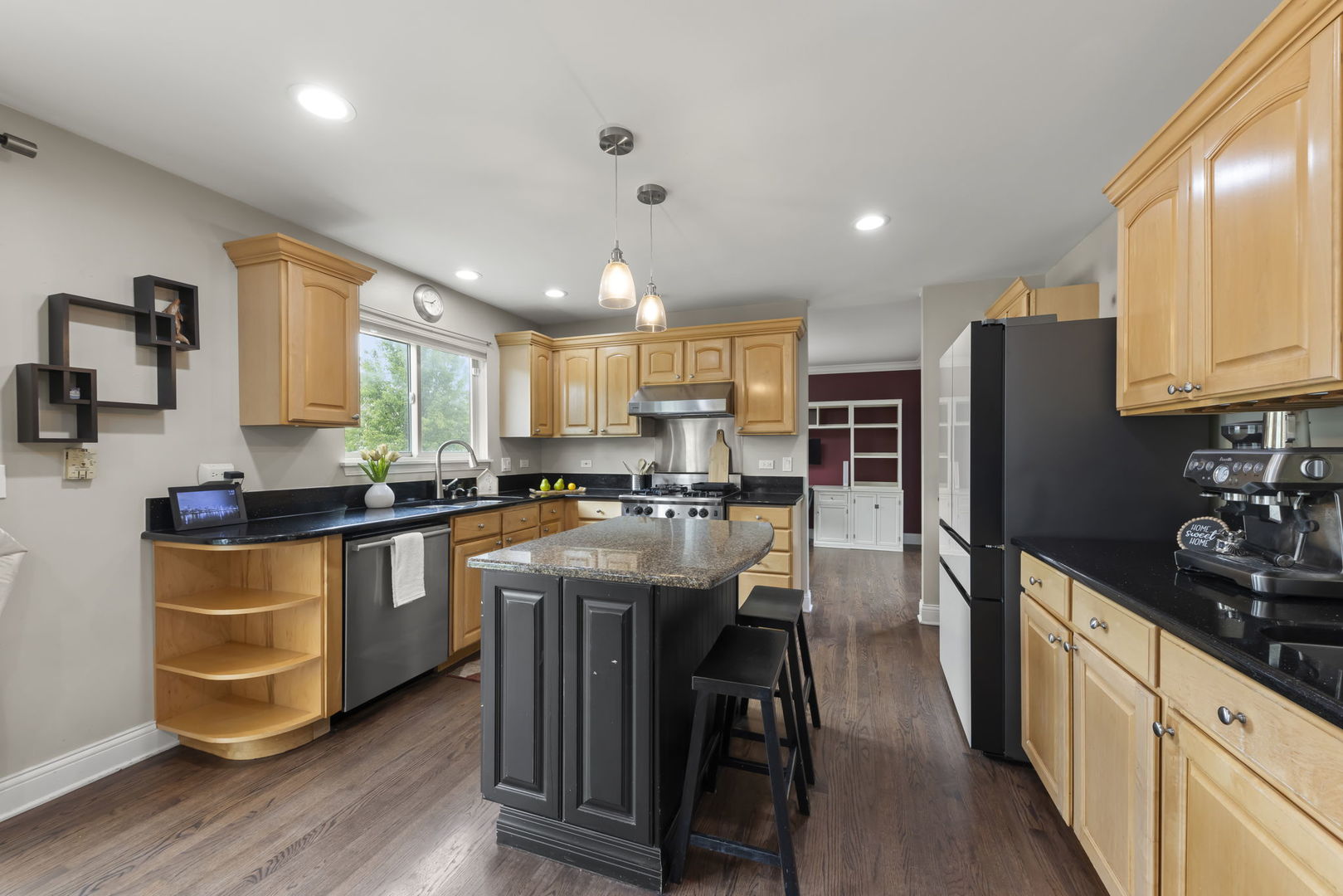 1462 Haversham Drive Aurora, IL 60502 - Photo 10 of 44 a kitchen with stainless steel appliances granite countertop a refrigerator a sink dishwasher a stove and white cabinets with wooden floor