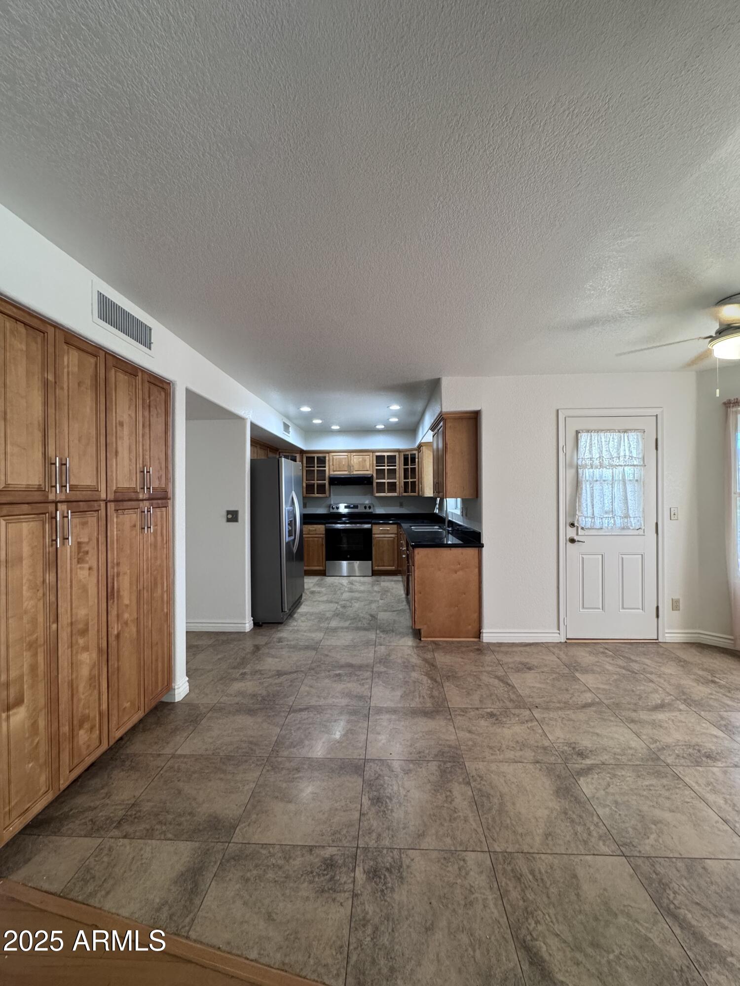 8631 West Monte Vista Road Phoenix, AZ 85037 - Photo 7 of 26 a view of a storage & utility room