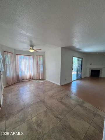 a view of empty room with windows