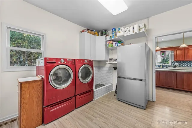 a bedroom with a bed a dresser and book shelf