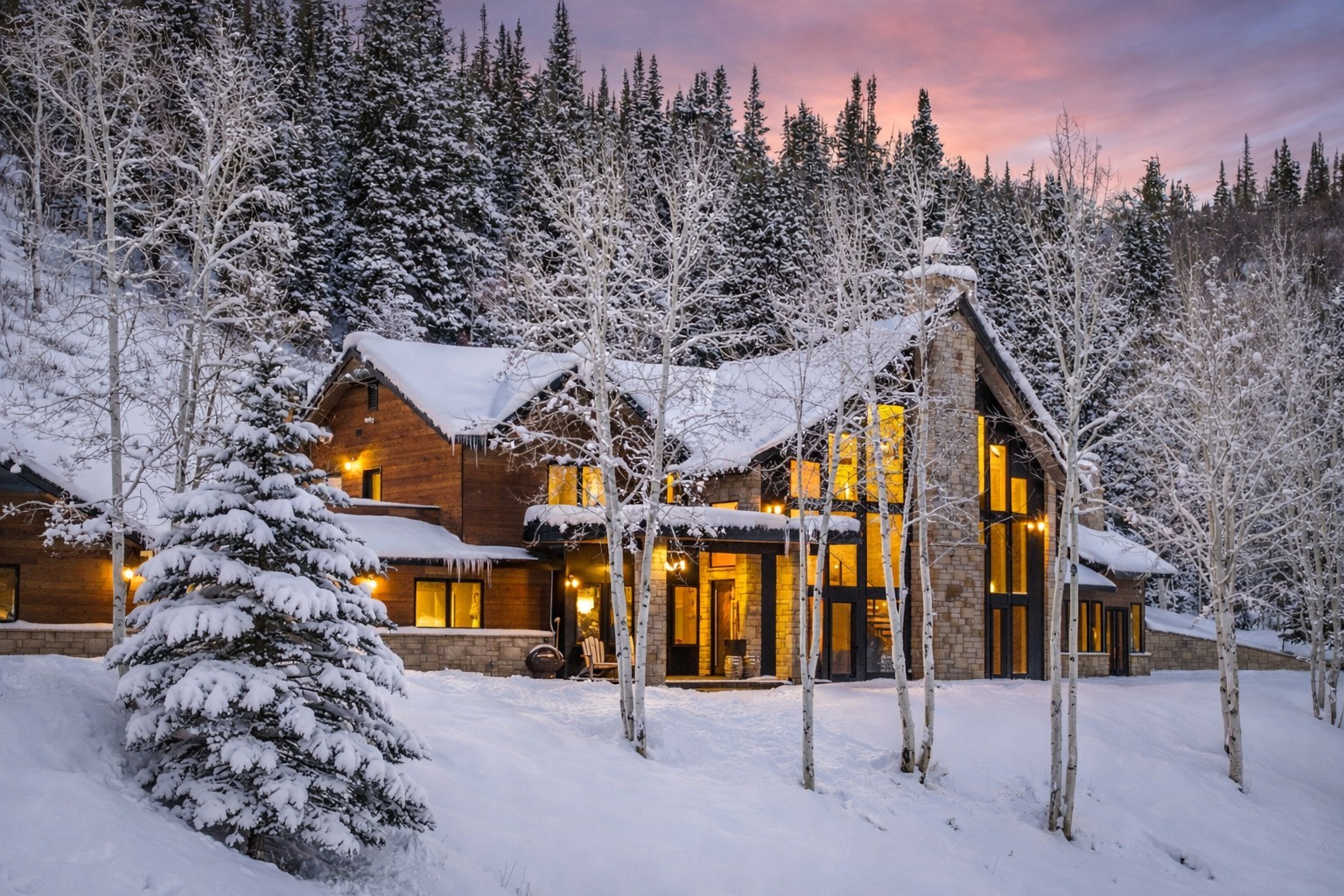 31655 Sugar Ridge Road Steamboat Springs, CO 80487 - Photo 4 of 49 a view of a large building in the forest
