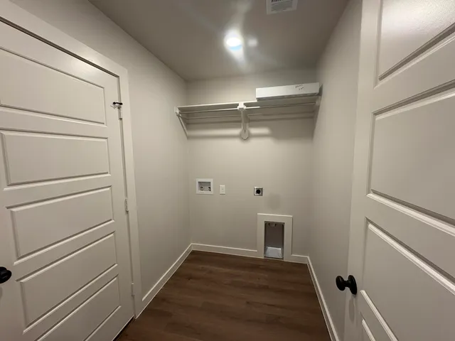 a view of an empty walk in closet