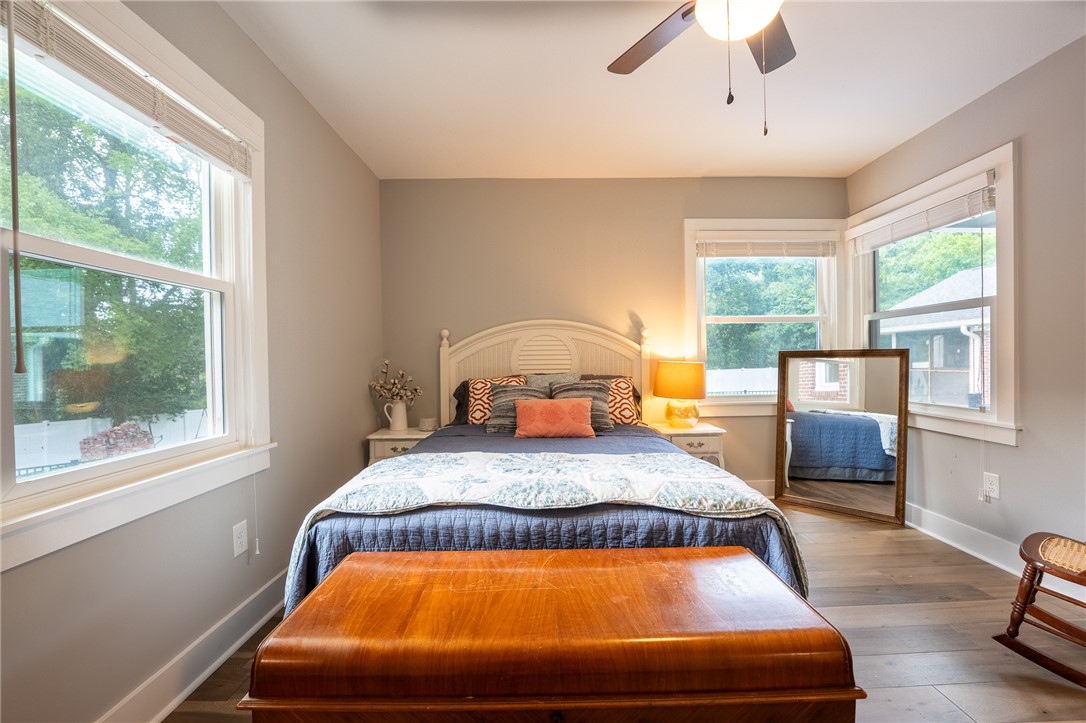 103 Riggs Drive Clemson, SC 29631 - Photo 25 of 50 Hardwood floors and generous window light illuminate this serene bedroom.