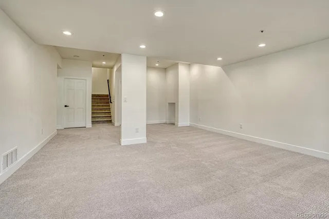 an empty room with an entryway