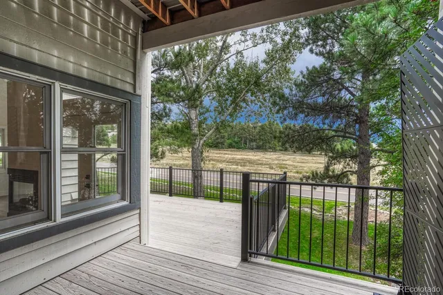 a view of a street from a balcony