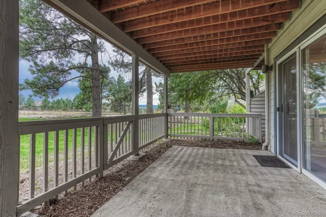 a view of backyard with green space