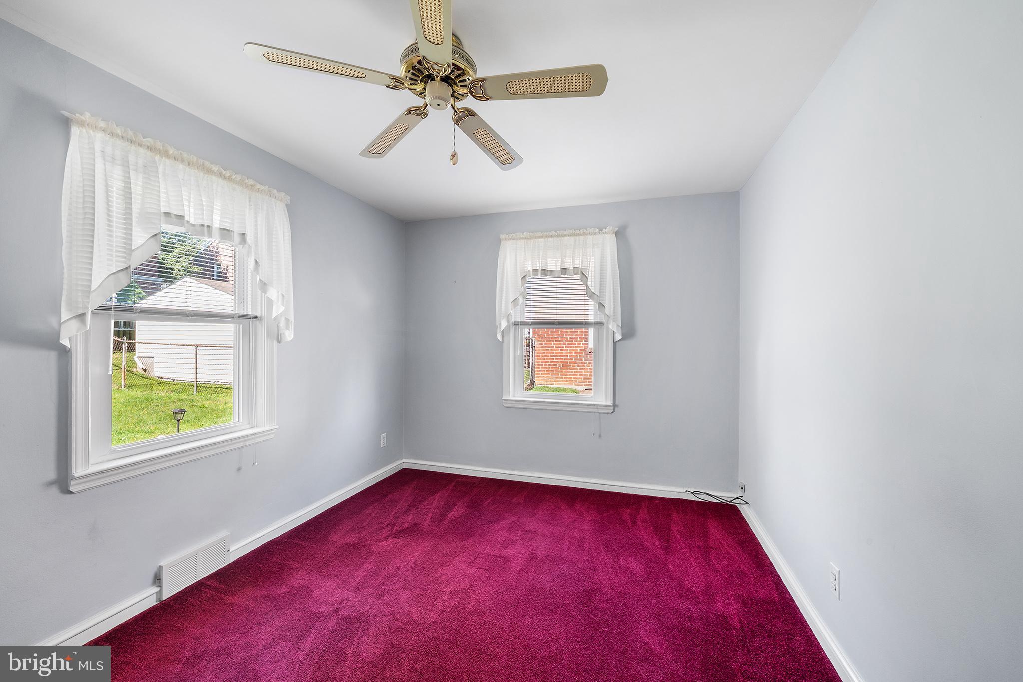 504 Lawrence Road Havertown, PA 19083 - Photo 10 of 20 an empty room with windows and fan
