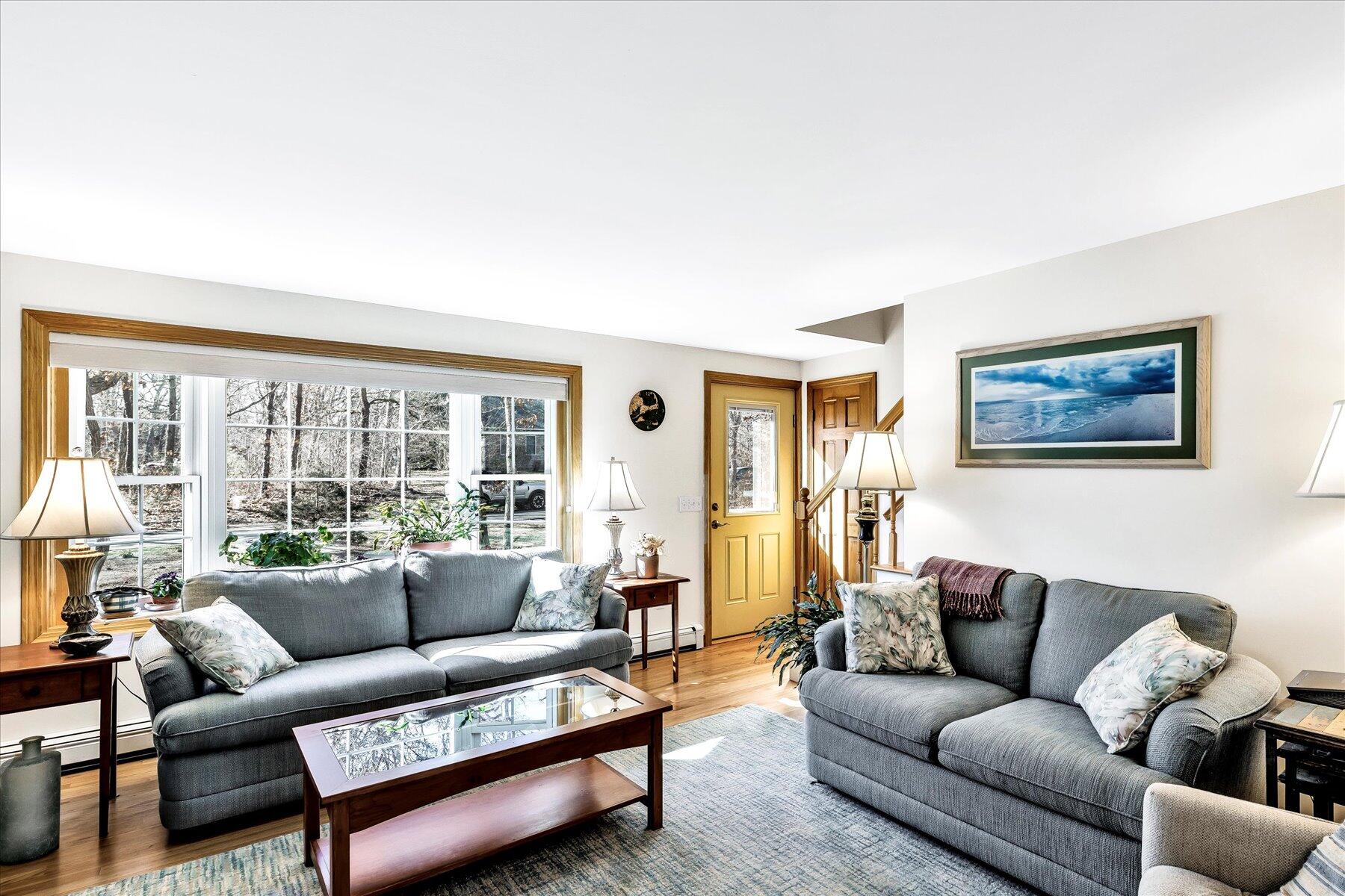 14 Fallon Road Eastham, MA 02642 - Photo 13 of 27 a living room with furniture and a large window