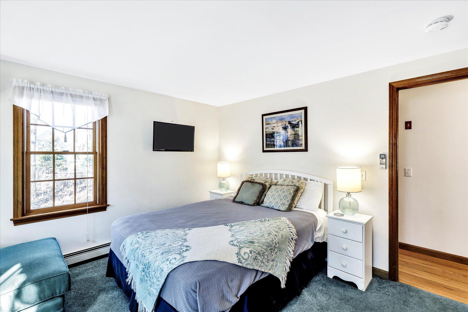 14 Fallon Road Eastham, MA 02642 - Photo 15 of 27 a bedroom with a large bed and a couch