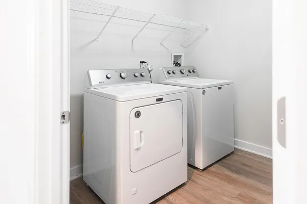 a utility room with dryer and washer