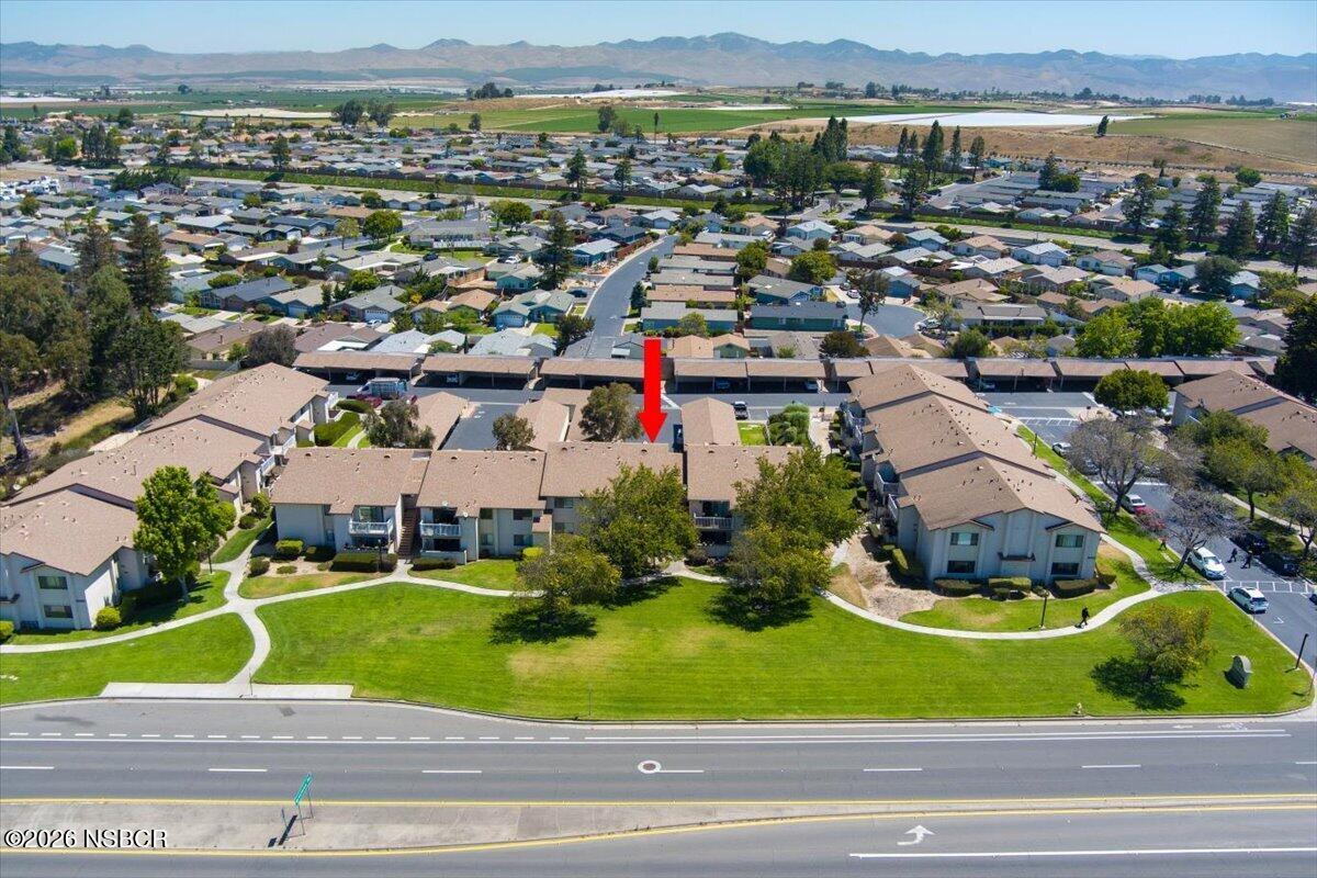3400 Santa Maria Way, Unit 207B Santa Maria, CA 93455 - Photo 46 of 50 an aerial view of residential houses with outdoor space and parking
