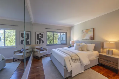 a bed room with a bed and a couch