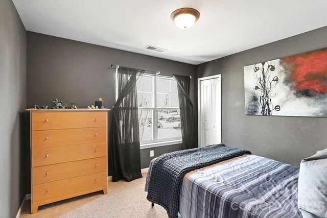 a view of a backyard with chairs