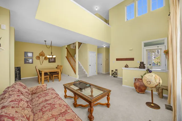 a bedroom with furniture and a wooden floor