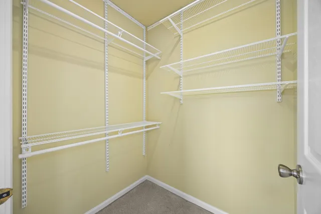 a view of a room with racks on the wall
