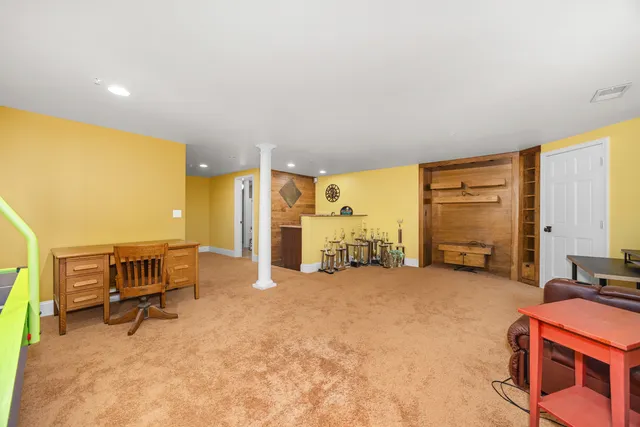 a view of a room with kitchen view