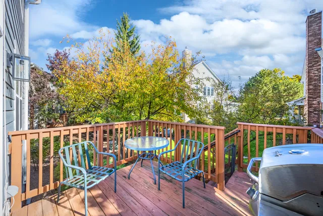 a view of a chair and table on the wooden floor
