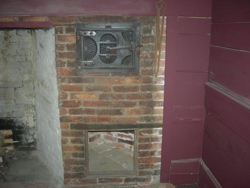 44 Rogers Point Road Steuben, ME 04680 - Photo 11 of 32 A close up of the bee-hive oven with...