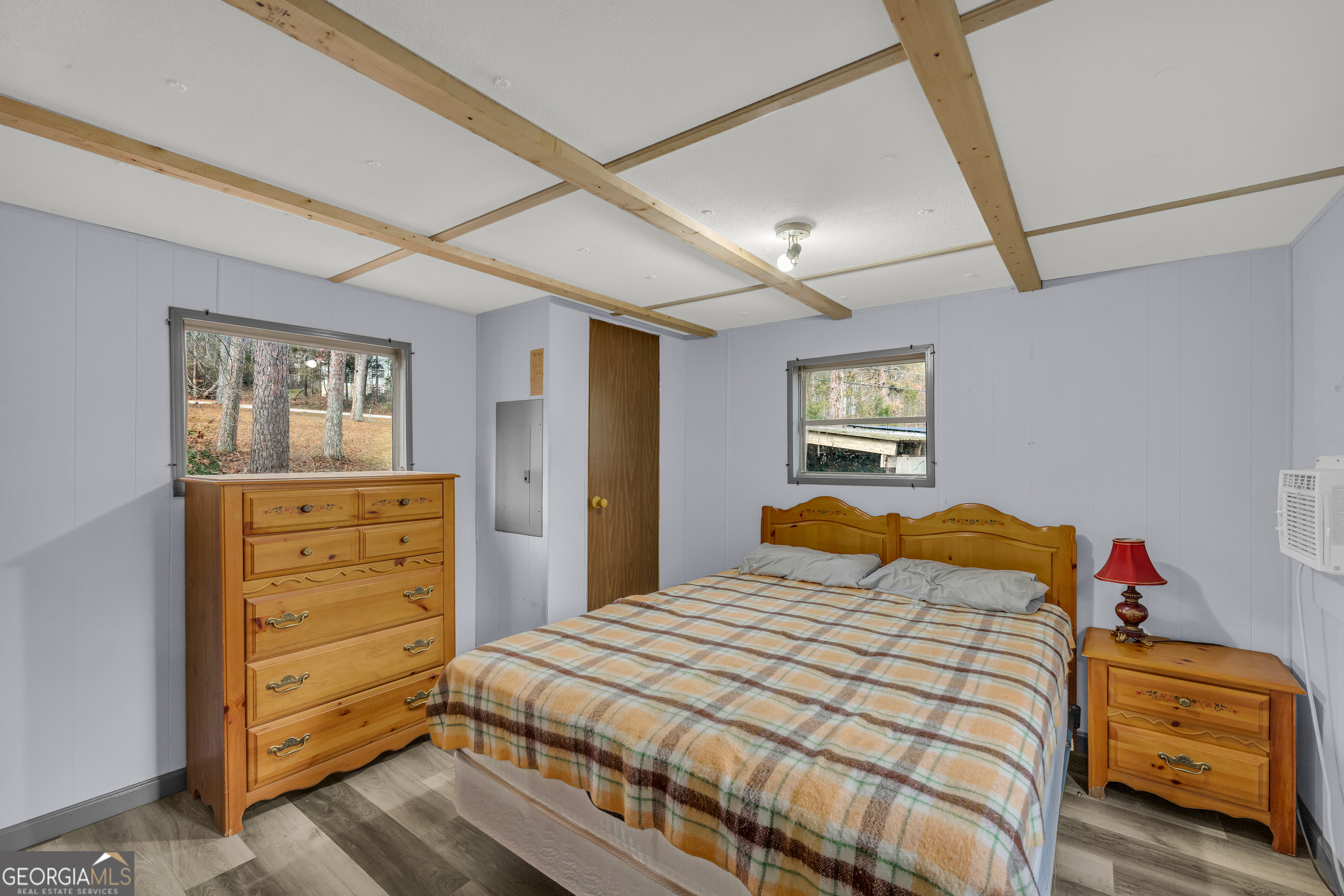 39 Valley View Drive Lavonia, GA 30553 - Photo 23 of 33 a bedroom with a bed and wooden floor