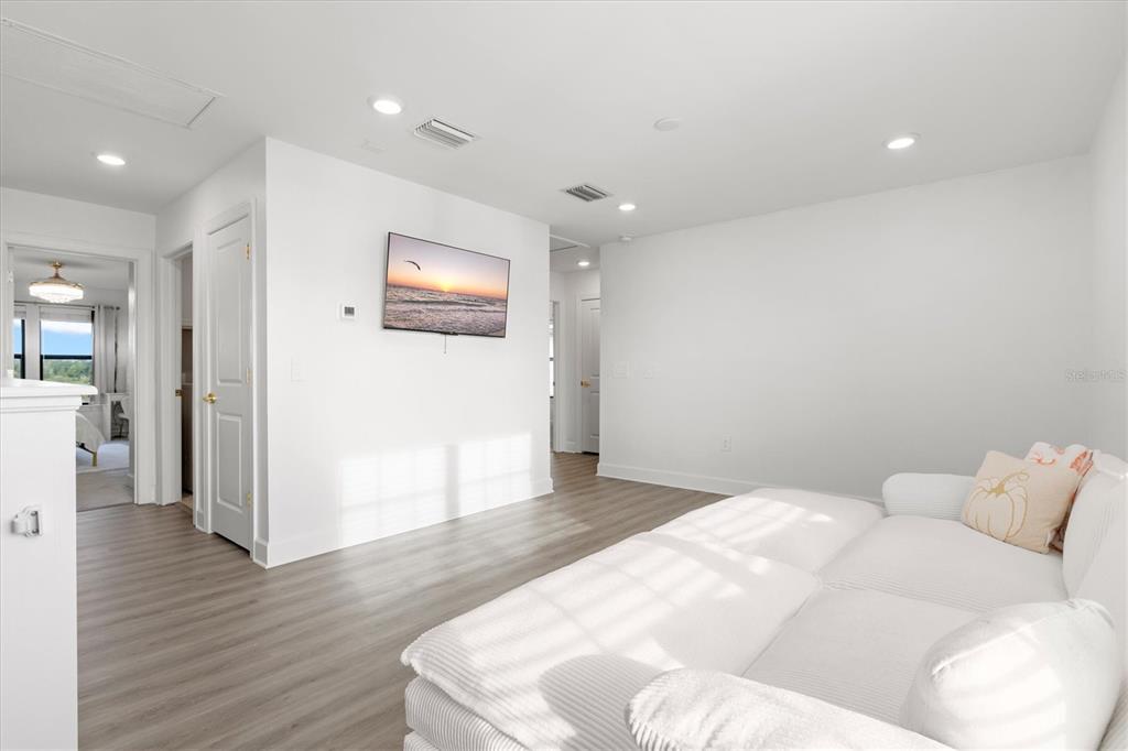 16235 Pine Mist Drive Bradenton, FL 34211 - Photo 19 of 100 a view of a livingroom with wooden floor