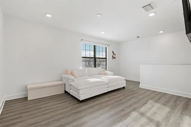 a bedroom with a bed and a table