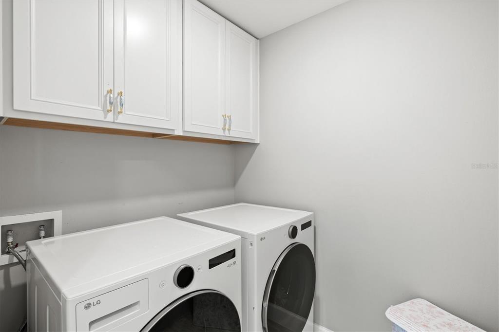 16235 Pine Mist Drive Bradenton, FL 34211 - Photo 22 of 100 a utility room with dryer and washer