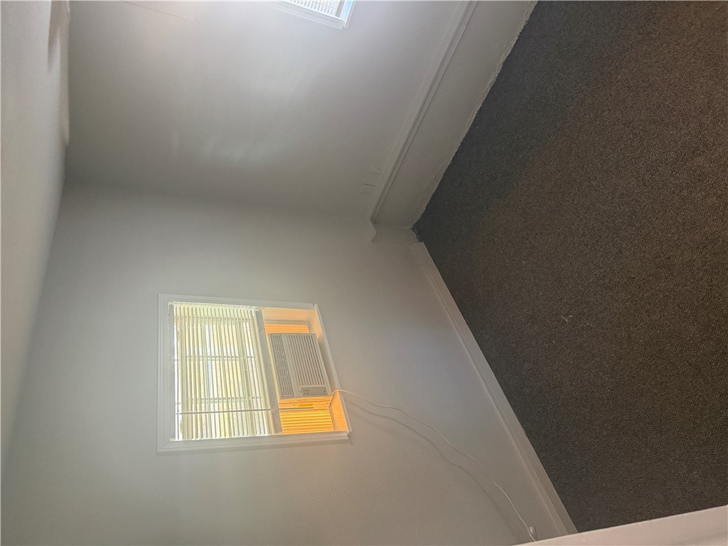 709 Churchill Drive Bryan, TX 77801 - Photo 14 of 31 an empty room with a window