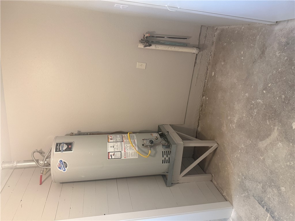 709 Churchill Drive Bryan, TX 77801 - Photo 15 of 31 an empty room with a door