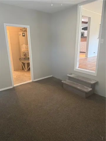 a view of small space with racks on the wall