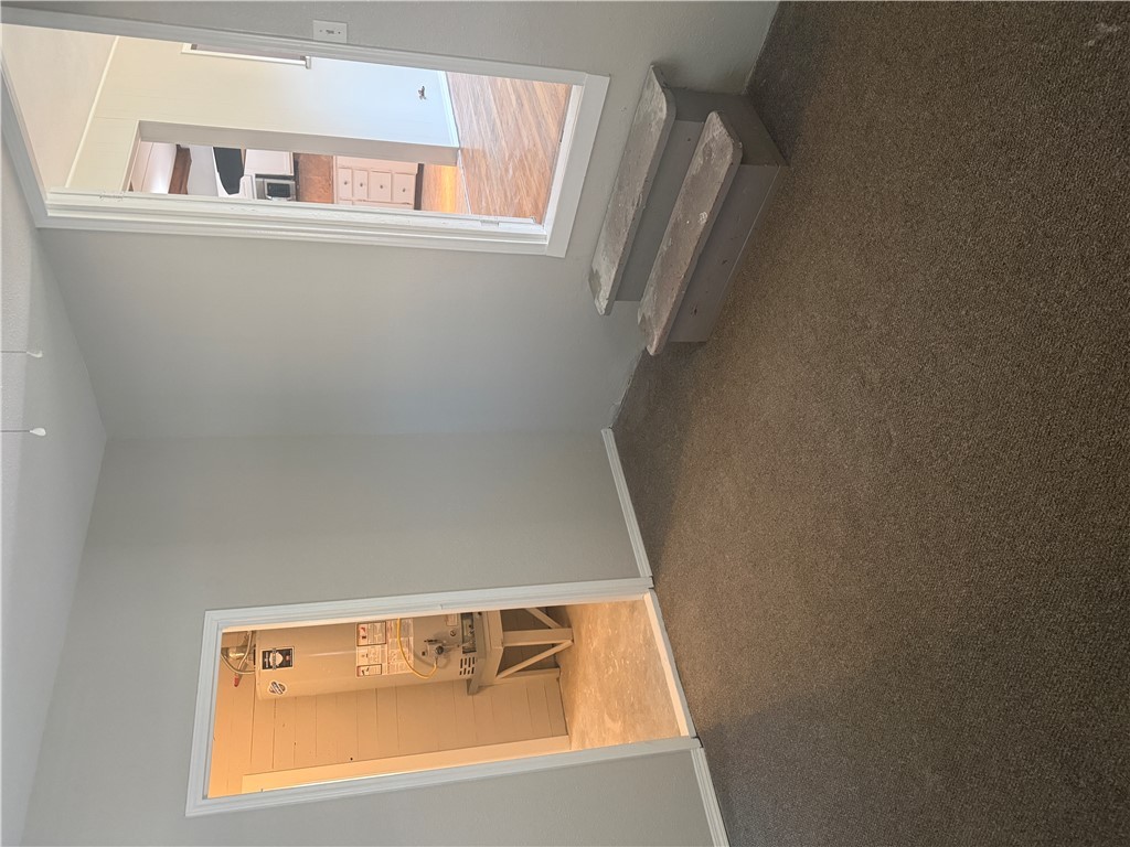 709 Churchill Drive Bryan, TX 77801 - Photo 17 of 31 an empty room with windows