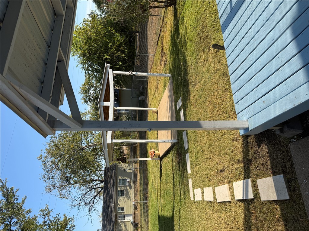 709 Churchill Drive Bryan, TX 77801 - Photo 22 of 31 a view of a swimming pool with a patio