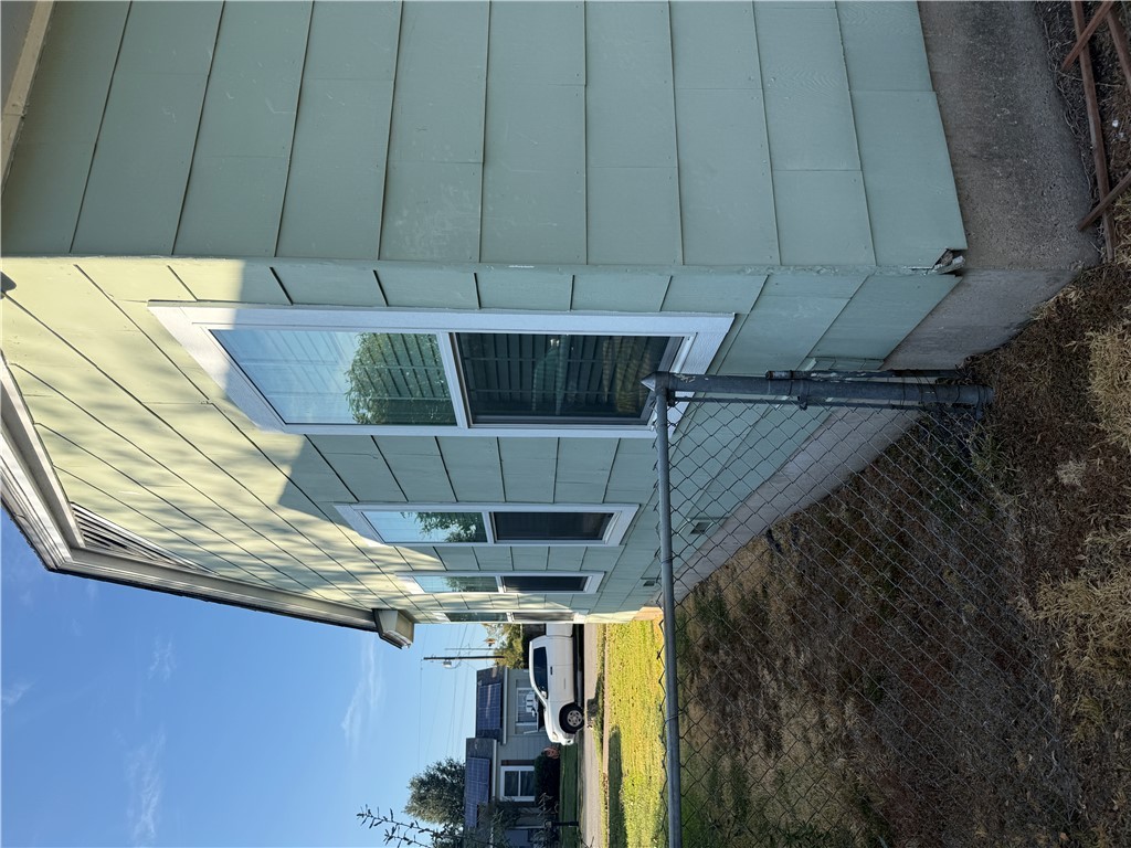 709 Churchill Drive Bryan, TX 77801 - Photo 25 of 31 a view of a house with backyard and swimming pool