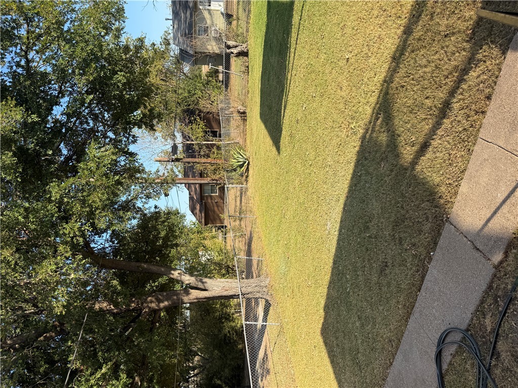 709 Churchill Drive Bryan, TX 77801 - Photo 27 of 31 a view of a swimming pool with an outdoor space and seating area