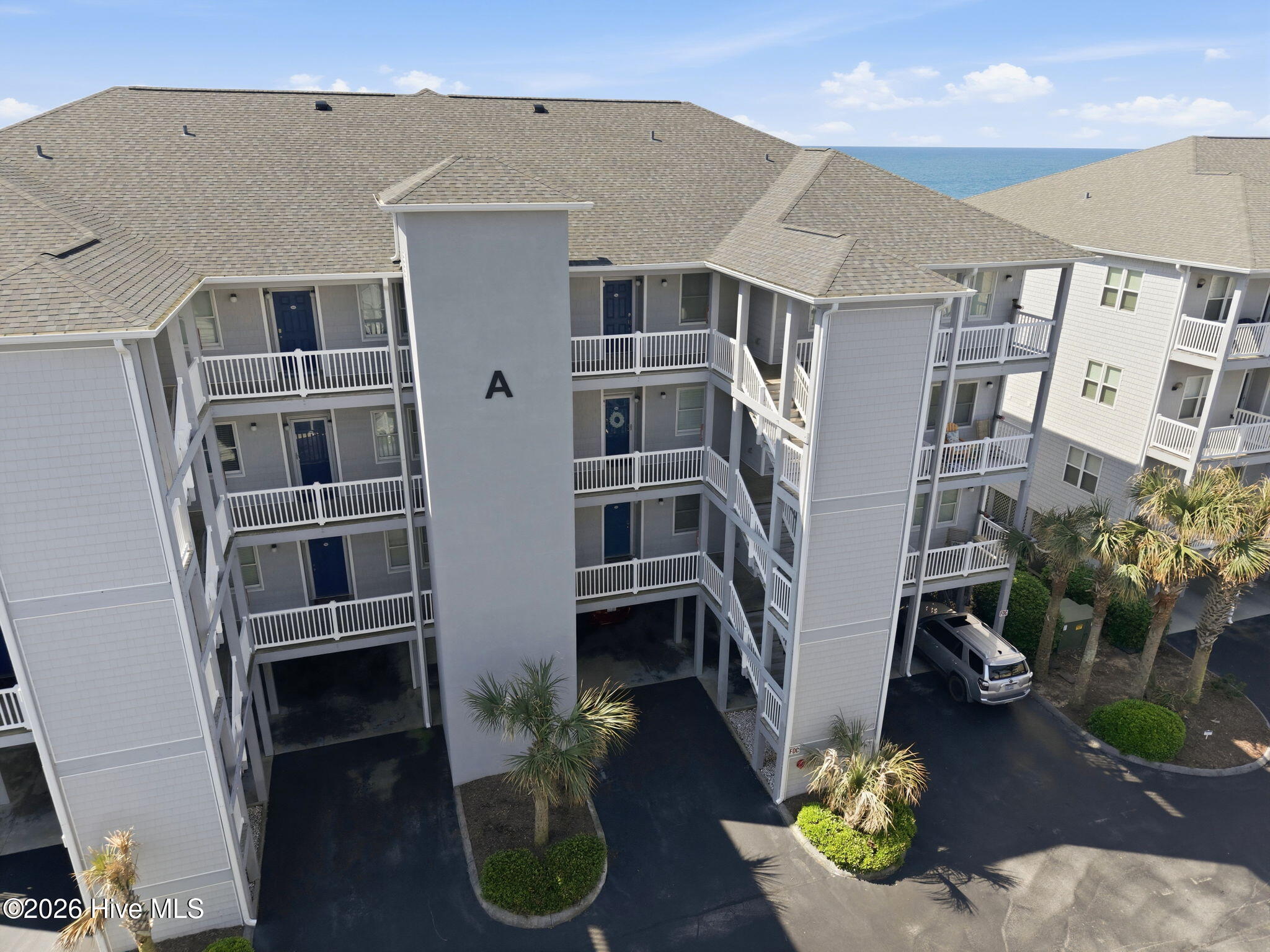 1701 Salter Path Road, Unit A103 Indian Beach, NC 28512 - Photo 1 of 52 2-web-or-mls-DJI_20260504102021_0054_D