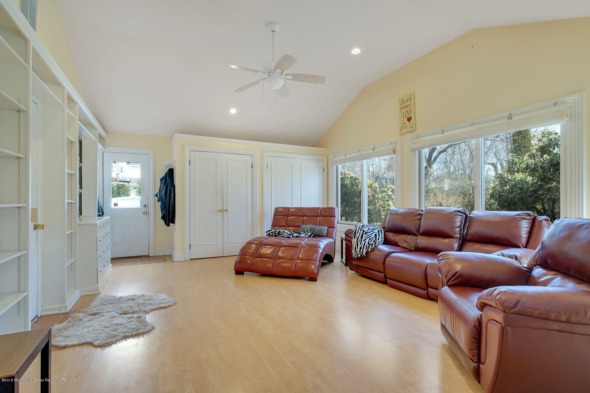 11 Heathcliff Road Rumson, NJ 07760 - Photo 14 of 31 a living room with furniture and a large window